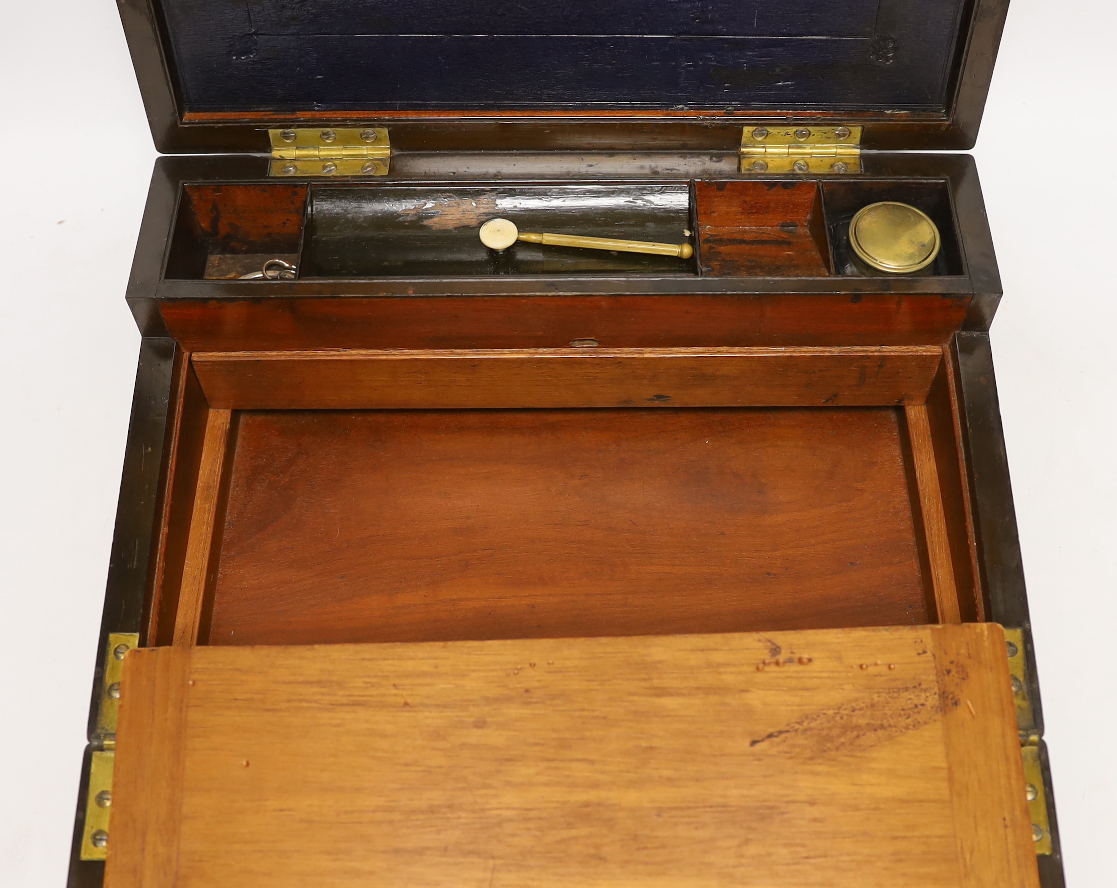 A 19th century brass bound mahogany writing slope, 35cm wide x 13.5cm high x 25cm deep